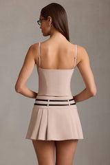 Velora-Belted Low-Rise Pleated Mini Skirt in Mushroom